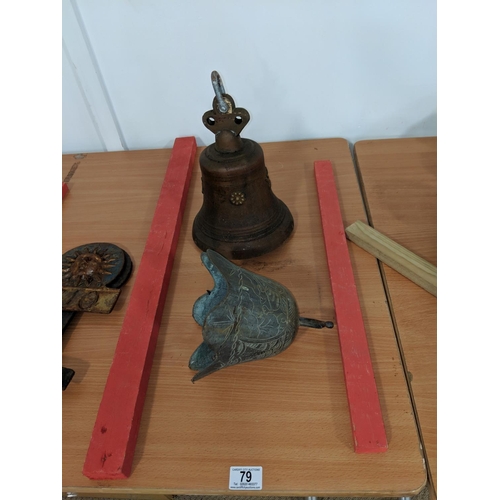 79 - A large bronze bell and a brass bell