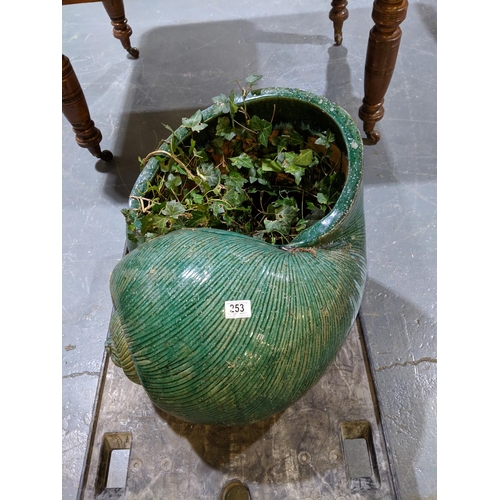 253 - A large snail shell, glazed garden planter