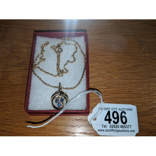 496 - A 9k gold chain and pendant with three blue stones (total weight including stones in excess of 5 gra... 