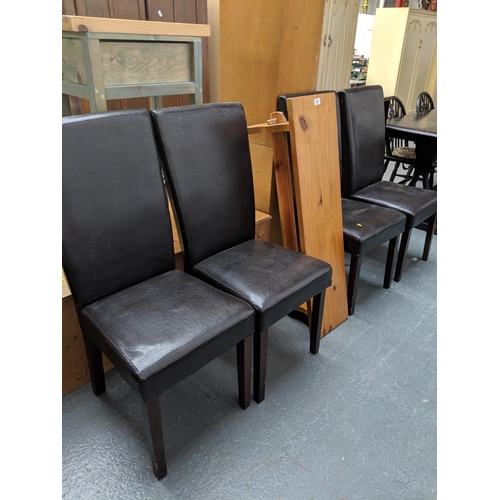 543 - Four leather effect dining chairs and a pine bench