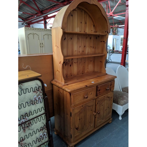 547 - A pine dome topped dresser