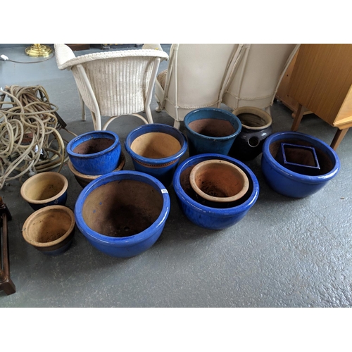 552 - A collection of glazed plant pots