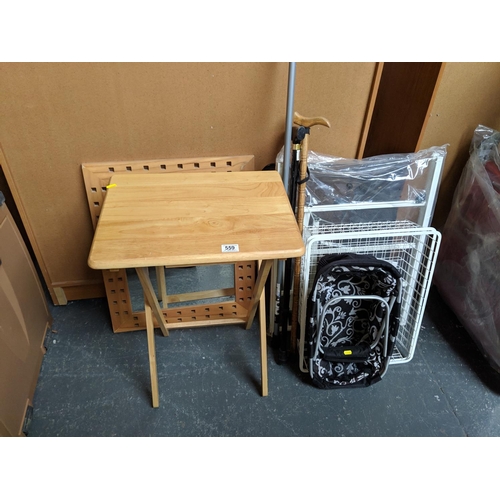 559 - A mirror, a folding table ,line prop etc and new vegetable rack