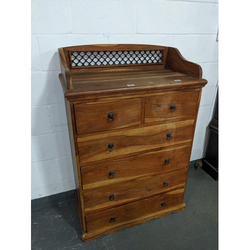 204 - A hardwood, six drawer chest of drawers
