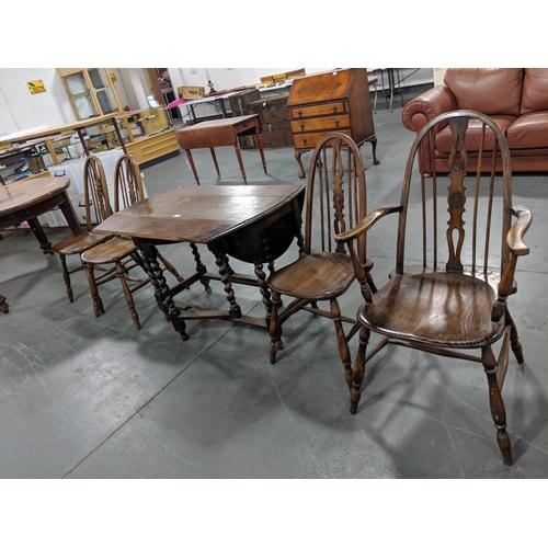 216 - Four farmhouse chairs and an oak table ( for restoration)