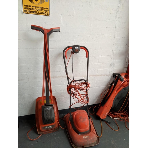 527 - Two Flymo lawnmowers and a leaf blower