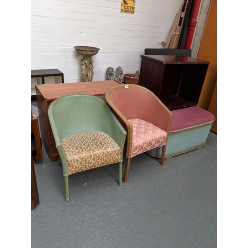 545 - Two lloyd loom style chairs and an ottoman