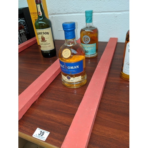 39 - Bruichladdich Islay single malt scotch whisky aged 10 years and a bottle of Kilchoman Machir Bay Isl... 