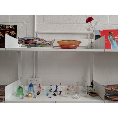 54 - Two shelves of glass including glass animal figures