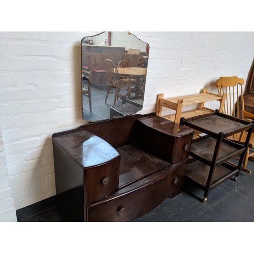 668 - A dressing table, pine storage unit, trolley and rocking chair