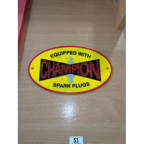 53 - A cast iron Champion Spark Pluss plaque