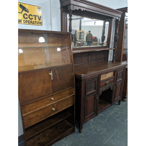 203 - A mahogany mirror backed dresser and an oak veneered cabinet