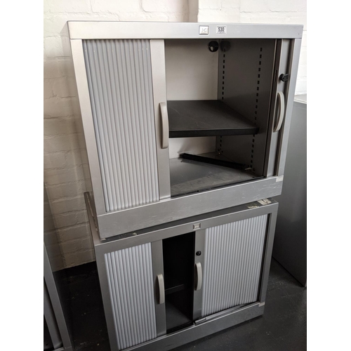 530 - Two metal office cabinets with roller doors
