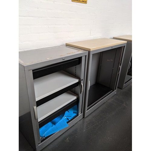 531 - Two metal office cabinets with roller doors