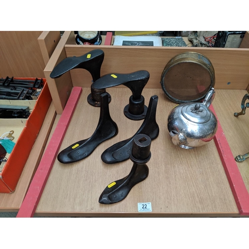 22 - 5 shoe lasts, a brass sieve and metalware
