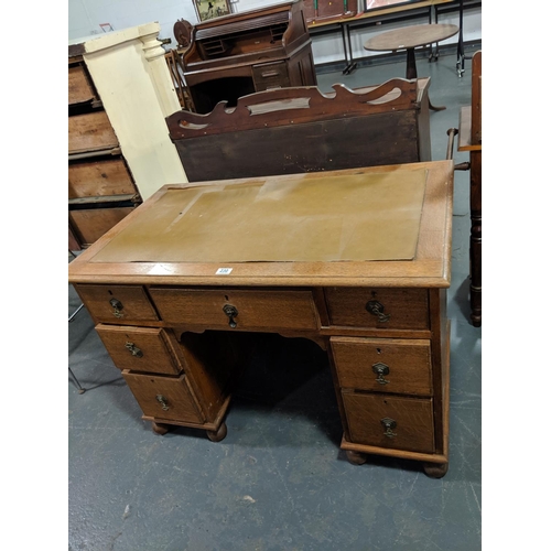 230 - An oak pedestal desk