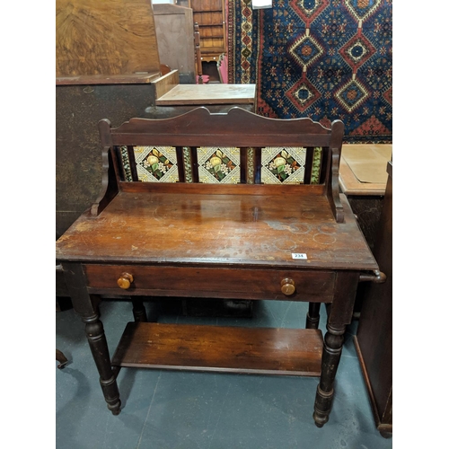 234 - A tile backed, pine washstand