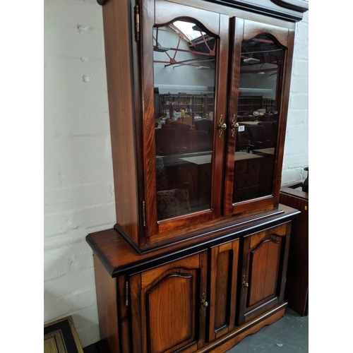 507 - A dresser with glazed upper section