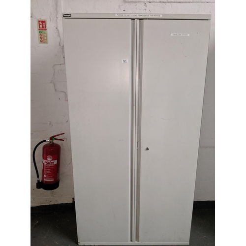 521 - A metal two door stationary cupboard