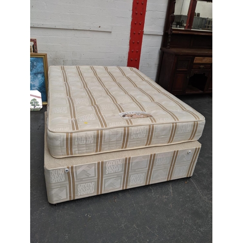652 - A double bed and mattress