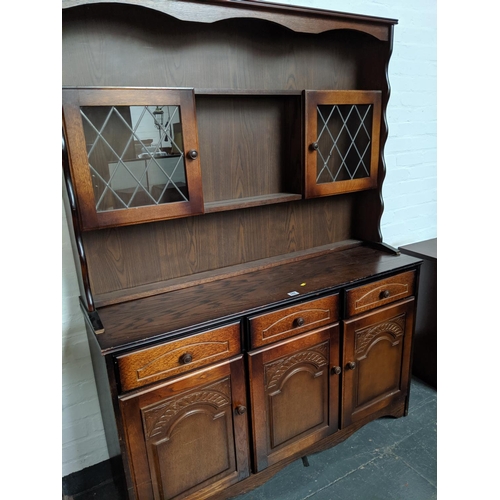 668 - A dresser with 3 drawers and 3 cupboards