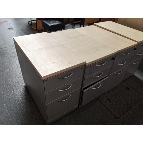676 - 4 metal office drawer units