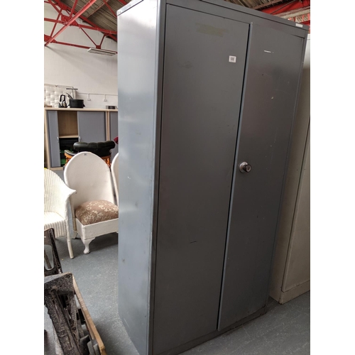 688 - A two door stationary cupboard