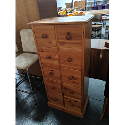 703 - A 10 drawer pine set of drawers