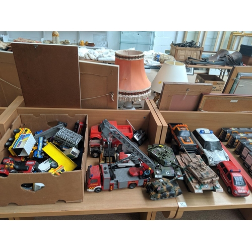 31 - A quantity of playworn vehicles including tanks