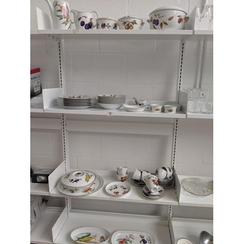 57 - Four shelves of Royal Worcester; dinner plates, bowls, coffee pot, cups,saucers etc.