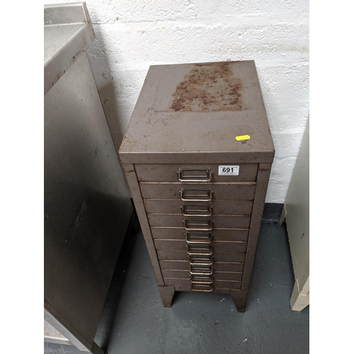 691 - A 10 drawer small metal filing cabinet
