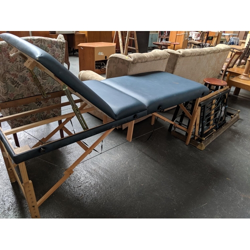 703 - Massage bed, 2 stools, table and fireguard