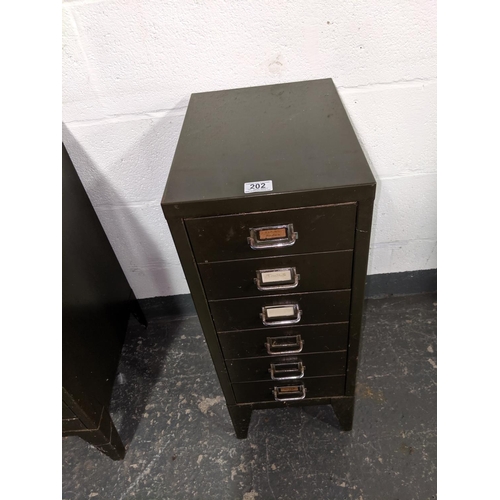 202 - A vintage six drawer metal filing cabinet