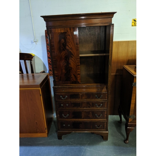 212 - A mahogany two door cabinet above five drawers