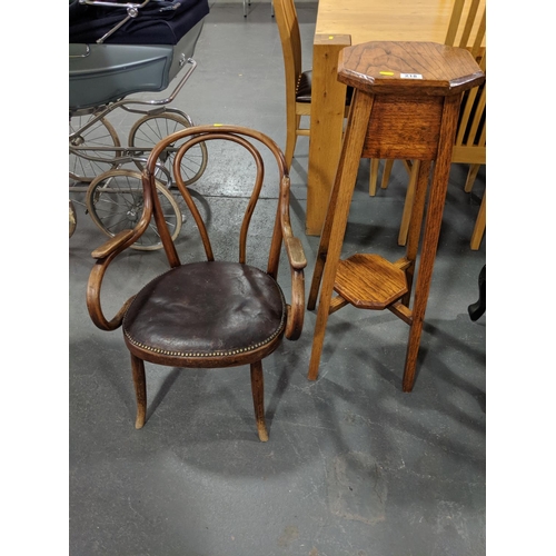 218 - A low Bentwood chair and an oak plant stand