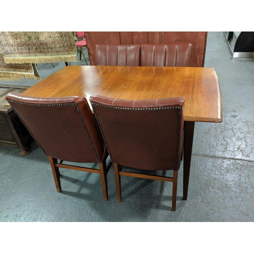 221 - An Alfred Cox, teak, mid century dining table and four chairs