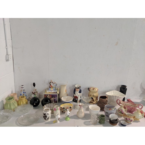 105 - Figural lamps, large Toby jug, Wade etc.