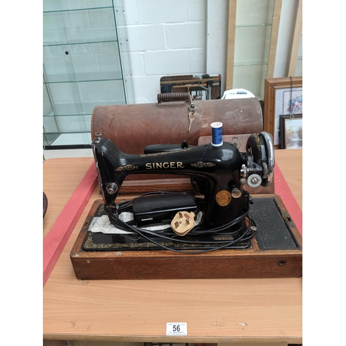 56 - A Singer sewing machine in case
