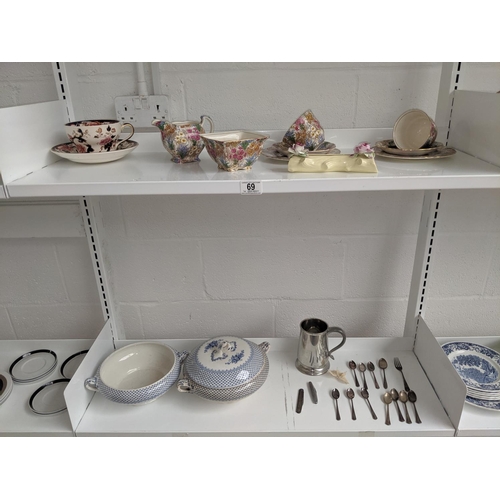 69 - Two shelves containing silver pen knife, silver plated items, Masons china etc.