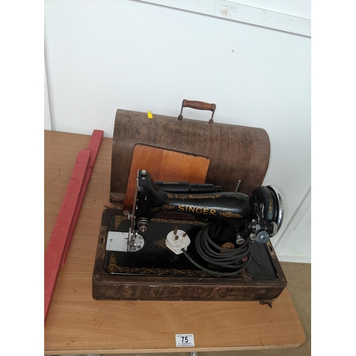 75 - An early Singer sewing machine in case