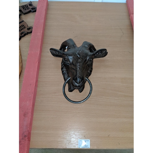 76 - Cast iron goats head with ring