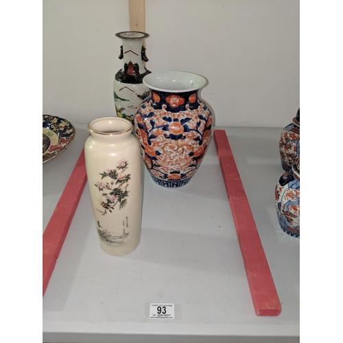 93 - An Imari vase and two Chinese vases