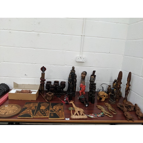 54 - A selection of African carved items