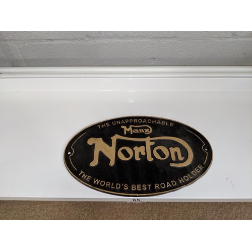 65 - A cast iron Manx Norton wall plaque