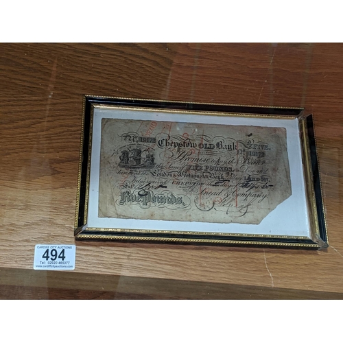 494 - A framed Chepstow old bank five pound note - 1865