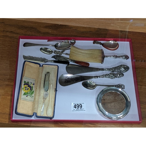 499 - A collection of small silver items- teaspoons, picture frame, penknife etc.