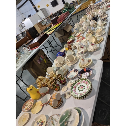 93 - A selection of fine china tea cups, teapots etc.