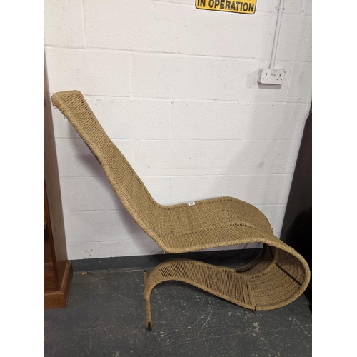 202 - A rattan- retro cobra chair