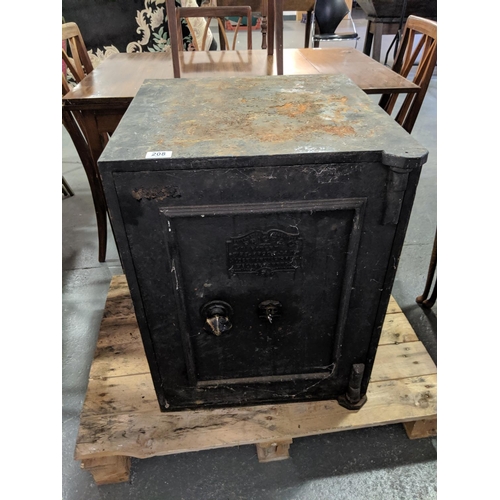 208 - A C Price antique safe with key