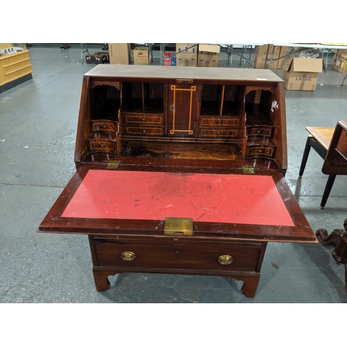 223 - A Georgian mahogany writing bureau with beautifully fitted interior